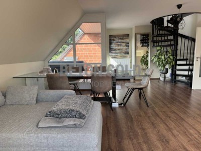Wunderschöne 4-Zimmer-Dachgeschosswohnung mit Loggia, zwei Balkonen und Tiefgaragenstellplatz