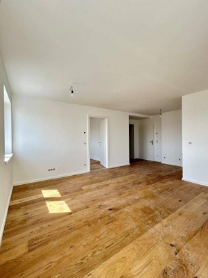 Erstklassige 73.8m² Wohnung mit Balkon in Mannswörth, Perfekt für Erstbezug!