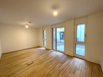 Tolle 1-Zimmer Wohnung mit eigenem Garten zum Genießen! Erstbezug in toller Lage und provisionsfrei