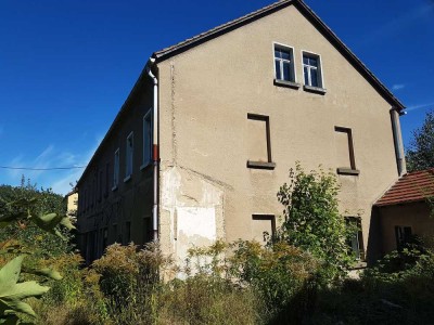 Solides Mehrfamilienhaus mit Ausbaupotenzial zur Sanierung