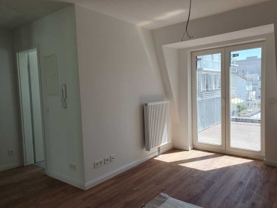 Schmuckstück im Neubau - ruhige 2 Zimmer-Terrassenwohnung in zentraler Lage