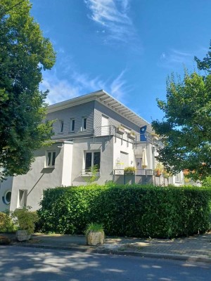 Stadtgartenwohnung in repräsentativem Architektenhaus mit Balkon