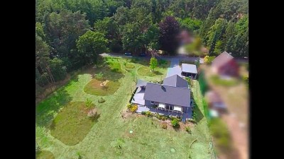 Nachhaltiges Holzhaus mit Ausbaupotenzial, hochwertiger Ausstattung und teilbarem Grundstück