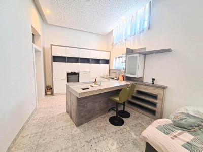 3-Zimmer-Eigentumswohnung mit Terrasse und Parkplatz
