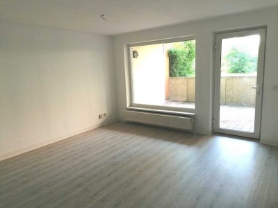 großzügige 3-Zimmer Souterrainwohnung mit Küche und Terrasse!