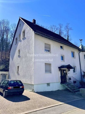 Mehrfamilienhaus mit aufgeteilten Einheiten