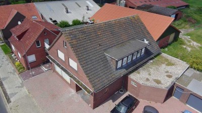 Zweifamilienhaus mit Gewerbeeinheit in Papenburg – Vermietetes Wohnhaus + großzügiger Anbau