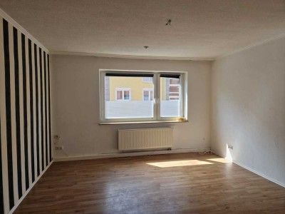 zentral gelegene 3-Zimmerwohnung mit Balkon und Tiefgaragenstellplatz