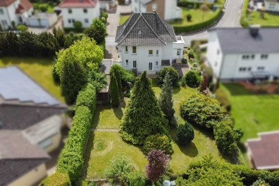 Charmantes Wohnhaus mit großem Garten und Entwicklungspotential