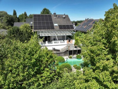 Einfamilienhaus mit Einliegerwohnung, Garten, Pool und Photovoltaik in Dickschied