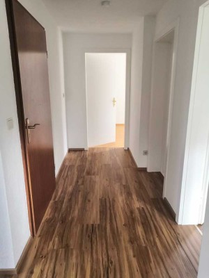 Geschmackvolle, sanierte 2-Raum-Wohnung mit gehobener Innenausstattung mit Einbauküche in Neubiberg