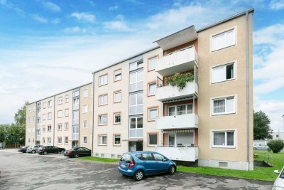 Hochparterre-Wohnung mit sonnigem Balkon und praktischer Aufteilung
