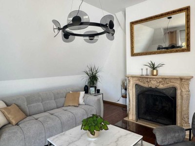 Exklusive Dachgeschoss-Traumwohnung mit atemberaubender Südwest-Terrasse und Weitblick ins Grüne