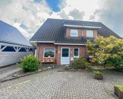Kapitalanlage: Vermietete Doppelhaushälfte mit Garten in guter Lage