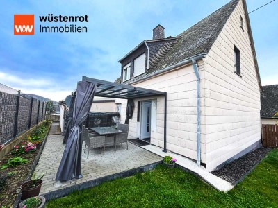 Gepflegtes Einfamilienhaus mit großem Garten, Sonnenterrasse und zusätzlichem Grundstück