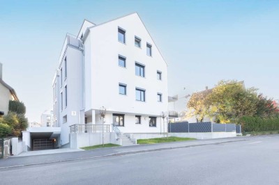 Neubau - Idyllisch, modern, gut angebunden: 2 Zimmer Wohnung mit EBK, Terrasse und Gartenanteil