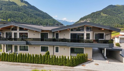 Exklusives Wohnen in Ruhelage – Neubau mit nur vier Wohneinheiten in Kössen, Top 2 im Erdgeschoss