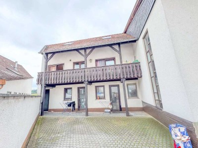 Stilvolle 2-Zimmer-Wohnung mit Kachelofen und Balkon – Wohnen mit Atmosphäre