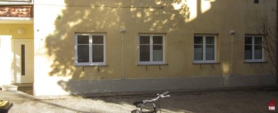 Zweizimmer Erdgeschosswohnung mit Blick in den begrünten Innenhof