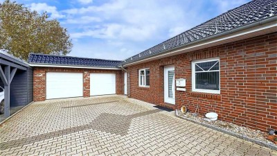 Ebenerdige Bungalowhälfte mit großer Doppelgarage und integrierter Werkstatt