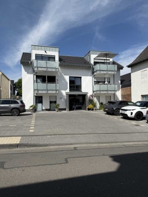 Neubau: Helle 3-Zimmer Wohnung mit gehobener Innenausstattung mit Terrasse und Garten in Bornheim