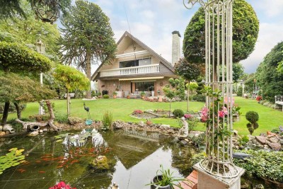 Großzügiges Einfamilienhaus mit Wintergarten und liebevoll gestaltetem Garten in Rees-Millingen