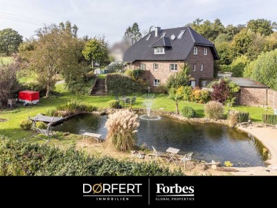 Exklusives Landhausambiente – freistehendes Anwesen in naturnaher Lage mit Naturteich