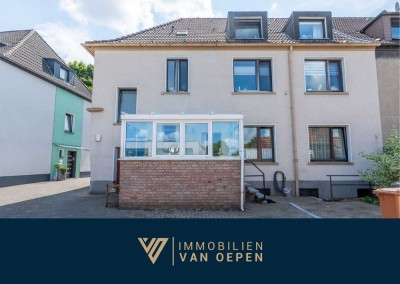 3-Familienhaus mit großem Garten, Wintergarten und 3 Garagen