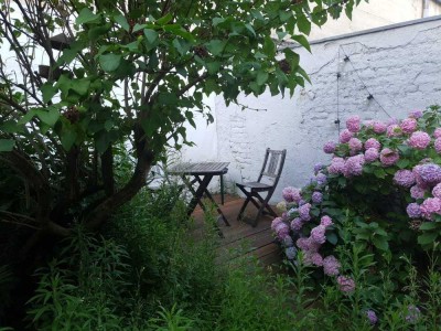 Helle und ruhige Innenstadtwohnung im Loftstyle, mit Wintergarten und kleinem Garten, möbliert