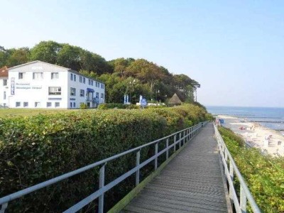 Strandnahe Eigentumswohnung mit schönem Grundstücksanteil, Terrasse und PKW Stellplatz