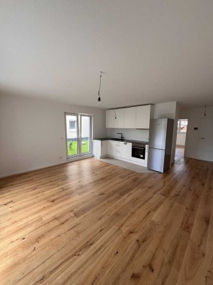 Erstbezug! Helle 2-Zimmer Wohnung mit Balkon und Garten
