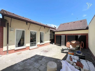 DREI ETAGEN VOLLER MÖGLICHKEITEN � Großzügiges Mehrfamilienhaus mit Garten & 3 Garagen!