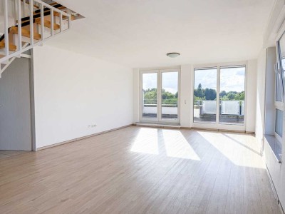 Moderne Maisonette-Dachgeschosswohnung mit 2 Balkonen, Aufzug und Tiefgarage in beliebter Lage