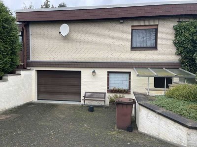 Wohlfühl-Bungalow mit Wintergarten und Tiefgarage in familienfreundlicher Lage