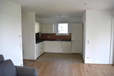Moderne 3-Zimmer Neubauwohnung mit Balkon und Carport