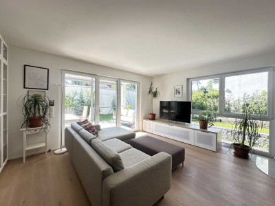 Stilvoll wohnen auf zwei Ebenen- Charmante und hochwertige 4-Zimmerwohnung mit Garten Kamin und Einb