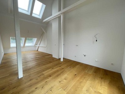 Erstbezug - Energieeffizienzklasse A - 3-Zimmer Dachgeschosswohnung mit Fußbodenheizung und Loggia