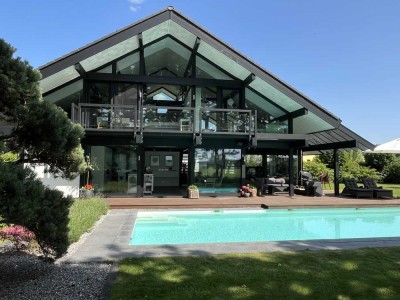 "Design trifft Natur: Ihr Traumhaus mit Pool"