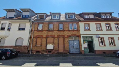 2 Mehrfamilienhäuser mit Innenhof und Garten.