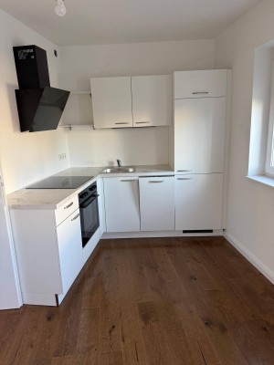 Moderne 1,5-Zimmer Erdgeschosswohnung mit Garten