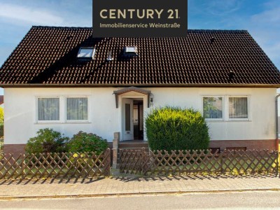 Einfamilienhaus mit idyllischem Garten. Ihr Potenzial in BESTLAGE.