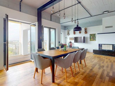 Skyline trifft Seeidylle: Design-Penthouse mit Weitblick und Wassergrundstück