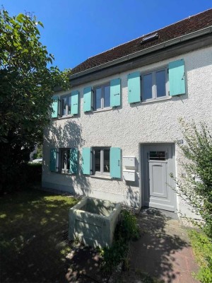 Helle Erdgeschoss-Wohnung mit Gartenzugang