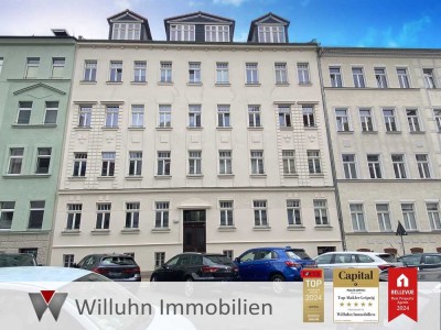 Balkon mit weitem Blick in den Innenhof in ruhiger Lage