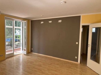 Schöne 3-Zimmer Maisonette-Wohnung mit Wintergarten, Terrasse, eigenem Garten und Hobbyraum in natur