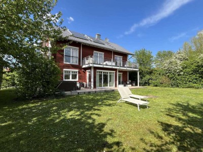 Design trifft Natur: exklusives Landhaus mit Gartenparadies