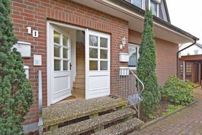 Haus-im-Haus:  Vermietete 3-Zimmer-Wohnung mit begehbarem Keller, Terrasse, Gartenanteil und Carport
