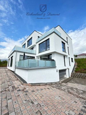 Neuwertiges Penthouse mit EBK + 3 Stellplätzen in Energie-Effizienzhaus