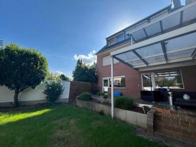 Drei-Zimmer-Wohnung im Erdgeschoss mit Terrasse und Garten