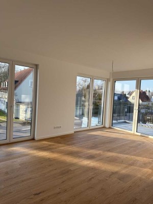 Erstbezug mit Balkon und Einbauküche: Geschmackvolle 3-Zimmer-Wohnung in Strandnähe